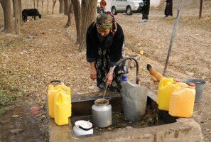 Woman gathering water