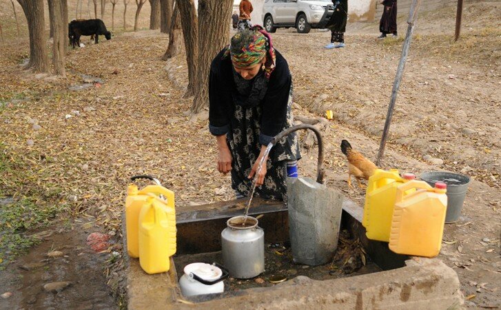 Woman gathering water